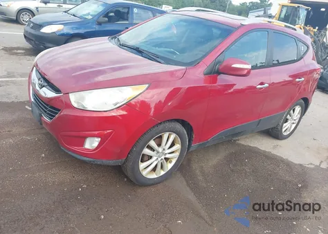 2011 Hyundai Tucson Limited from USA, damaged, VIN KM8JUCAC2BU311021